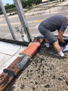 roof top coupling tile and tar repair